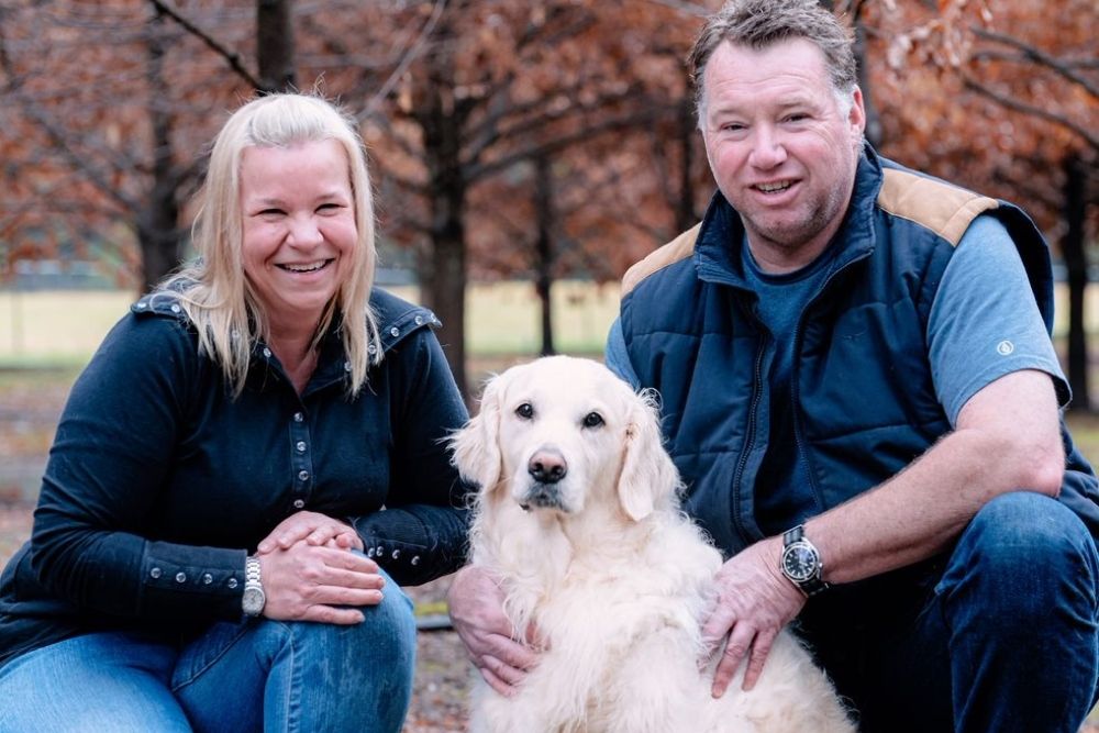 Taola and Mark Baldwin from Alpine Truffles with their Golden Retriever 'Truffle Dog' Charli