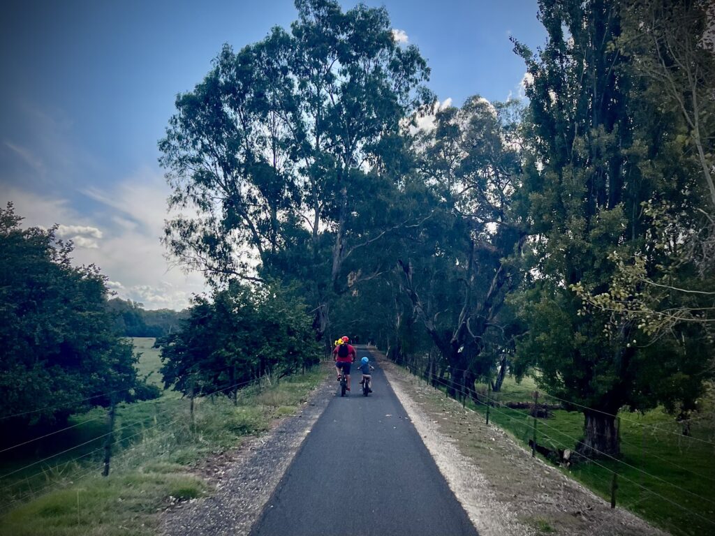 Cycling on the Murray to Mountains Rail Trail near Myrtleford and Ovens